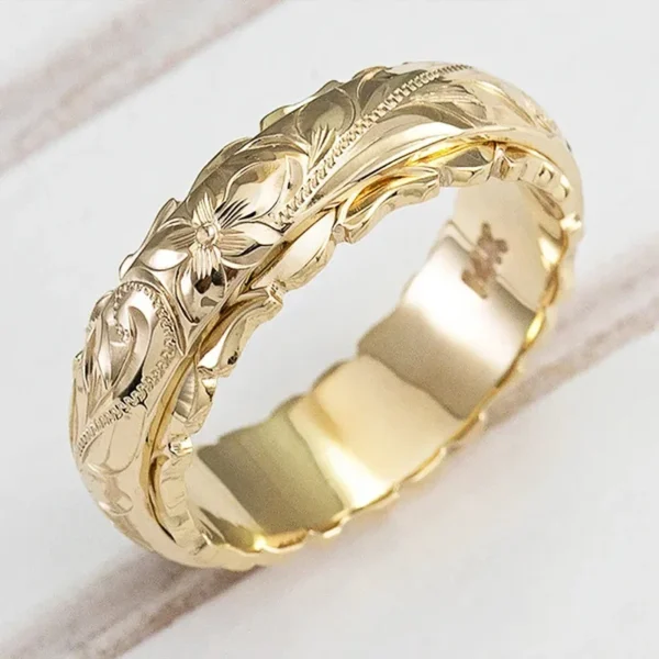 The 14K Gold Rose Flower Ring features a carved design with a sparkling zircon stone, perfect for engagements, weddings, or special occasions. A timeless and elegant piece for any collection.