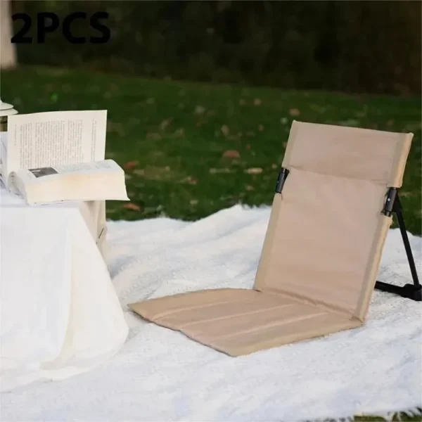 Portable foldable camping chair with backrest cushion, perfect for beach, garden, and park. Lightweight, easy to assemble, and ideal for outdoor relaxation.