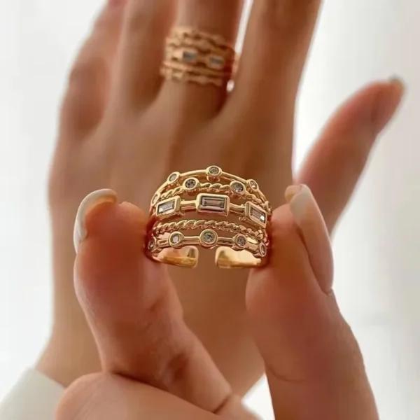 The 2024 Stainless Steel Sun Ring for Women features a sleek, modern design with a radiant sun motif. Finished with durable stainless steel and a stylish gold plating, this ring offers a bold yet elegant statement, perfect for any occasion