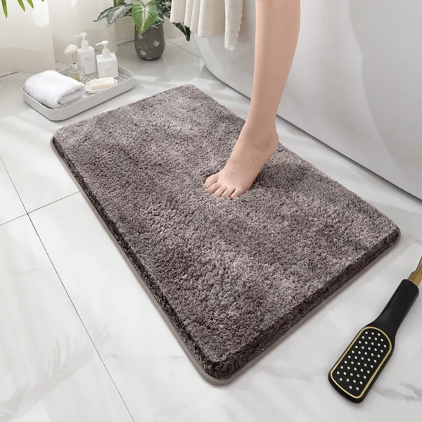 Plush non-slip floor mat with excellent water absorption. Perfect for bathrooms, bedrooms, kitchens, and living rooms. Soft, durable, and fade-resistant