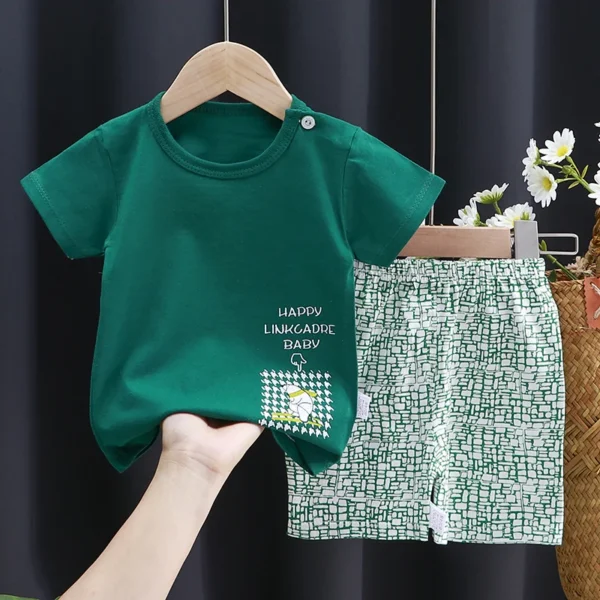 Adorable summer clothing set for toddlers aged 1-3 years. Includes a cotton cartoon T-shirt and shorts, perfect for boys and girls. Lightweight, breathable, and stylish.