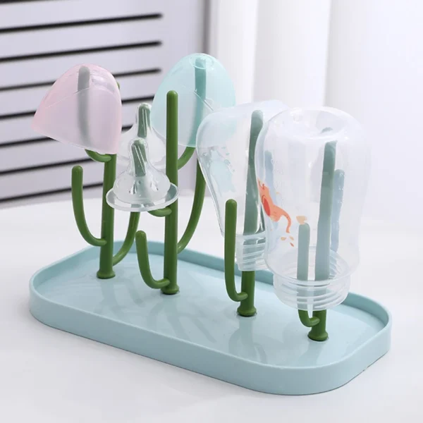 Keep baby bottles, nipples, and cups clean and dry with this Baby Feeding Bottle Drain Rack. Made from durable ABS and PP, it ensures quick drying and organized storage.