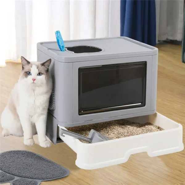 A foldable cat litter box with front entry and top exit, equipped with a massager for added comfort and a pull-out drawer for easy cleaning.